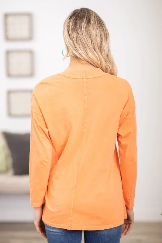 orange-washed-long-sleeve-top